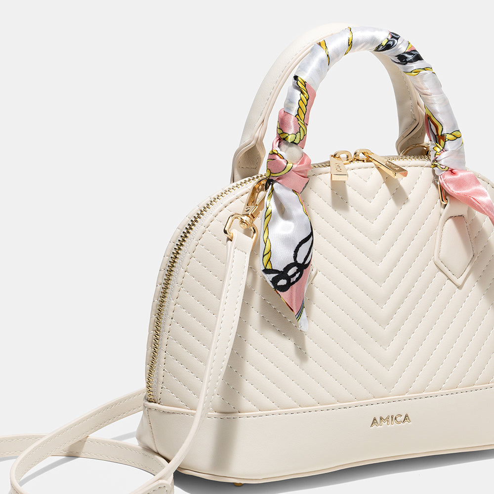 AMICA Junes Ladies Vegan Leather Dome Shaped Mini Crossbody Bag - Beige