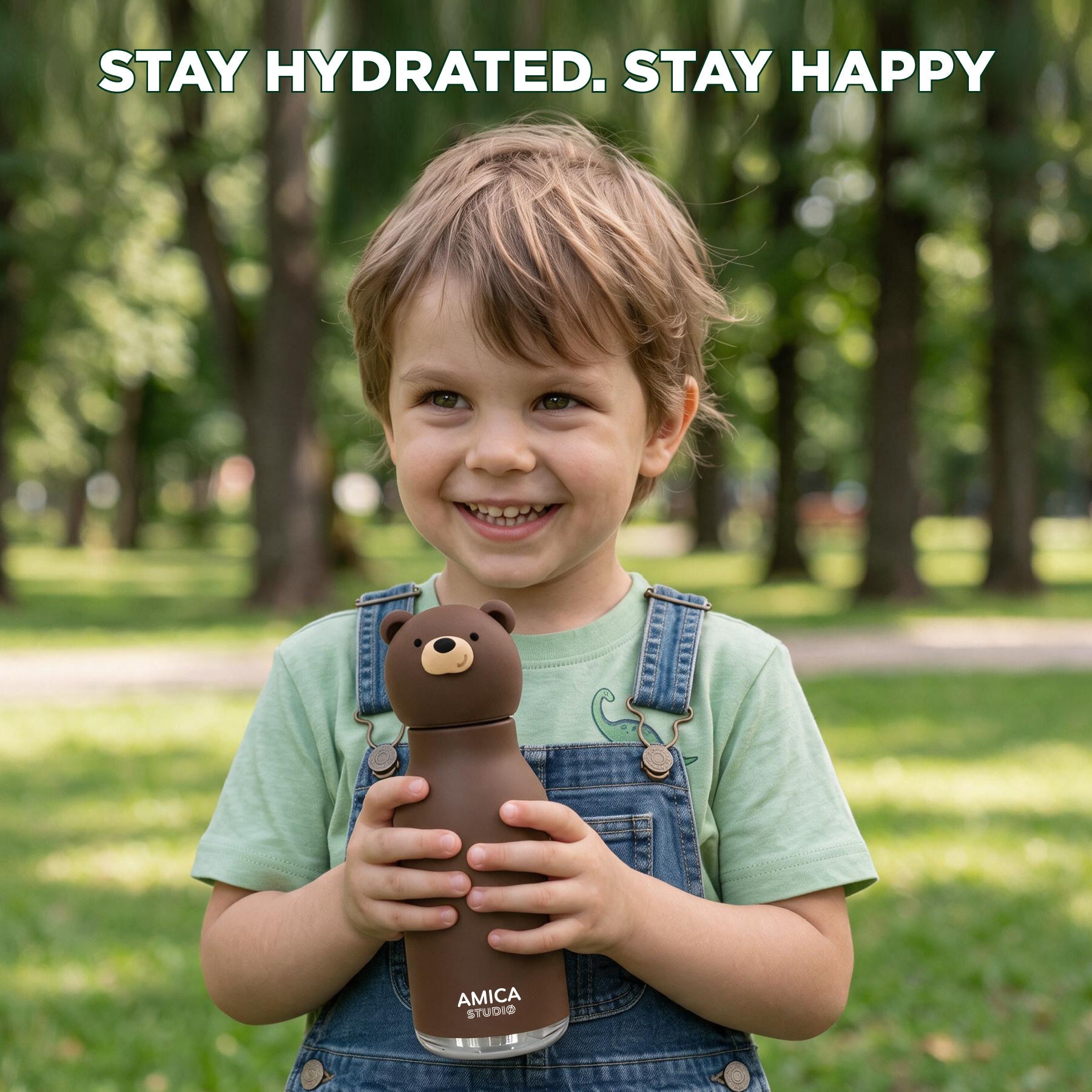 Child holding AMICA STUDIO Bruno the Brown Bear kids water bottle outdoors