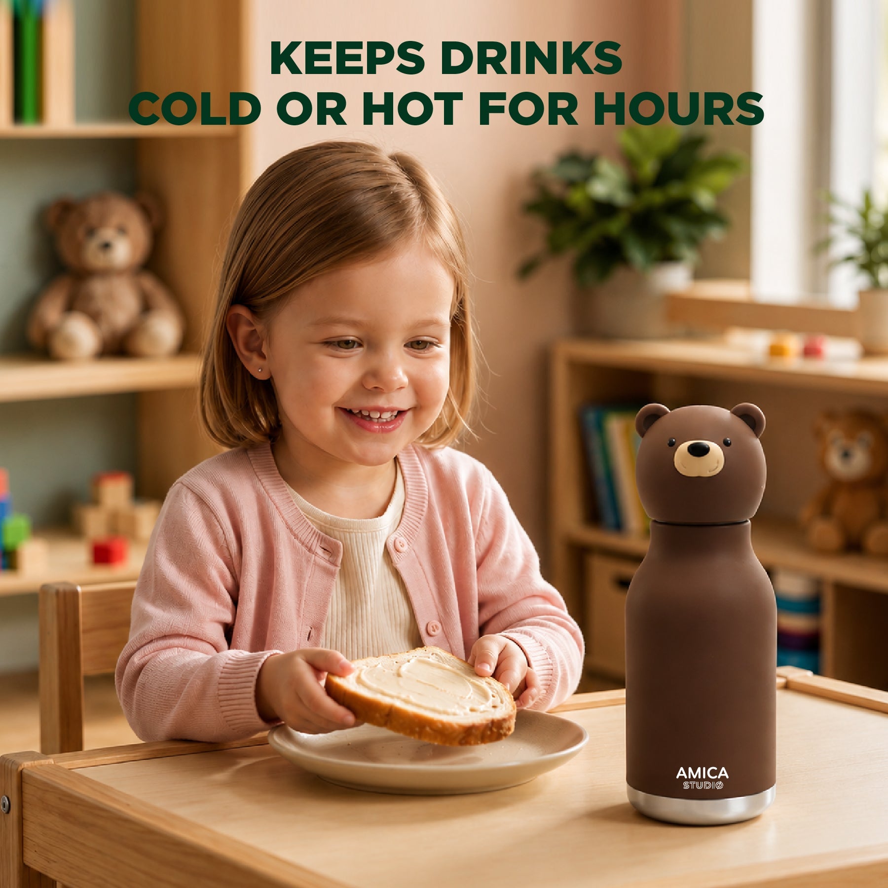 Child having a snack next to AMICA STUDIO Bruno the Brown Bear insulated kids water bottle